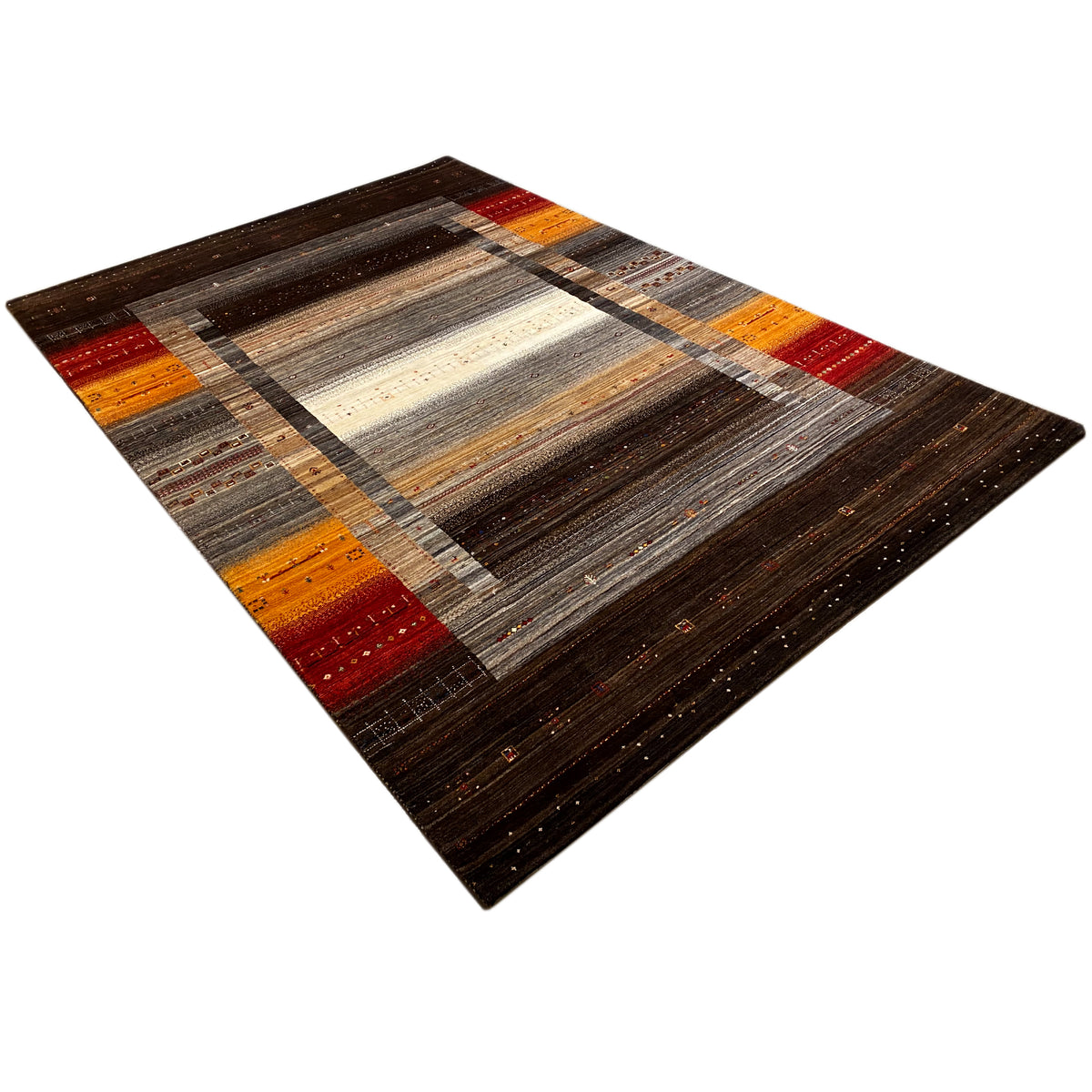 Rug from the corner: brown pattern with a gray-cream central area and orange-red stripes