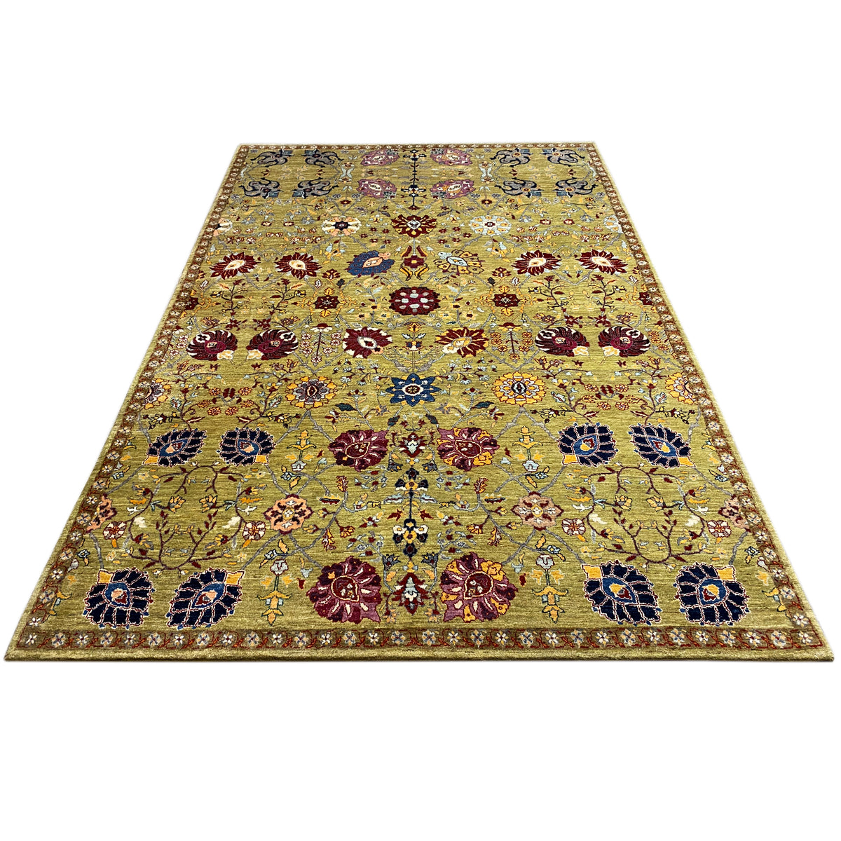 Oriental rug with abstract patterns in olive, blue, and red, lying flat