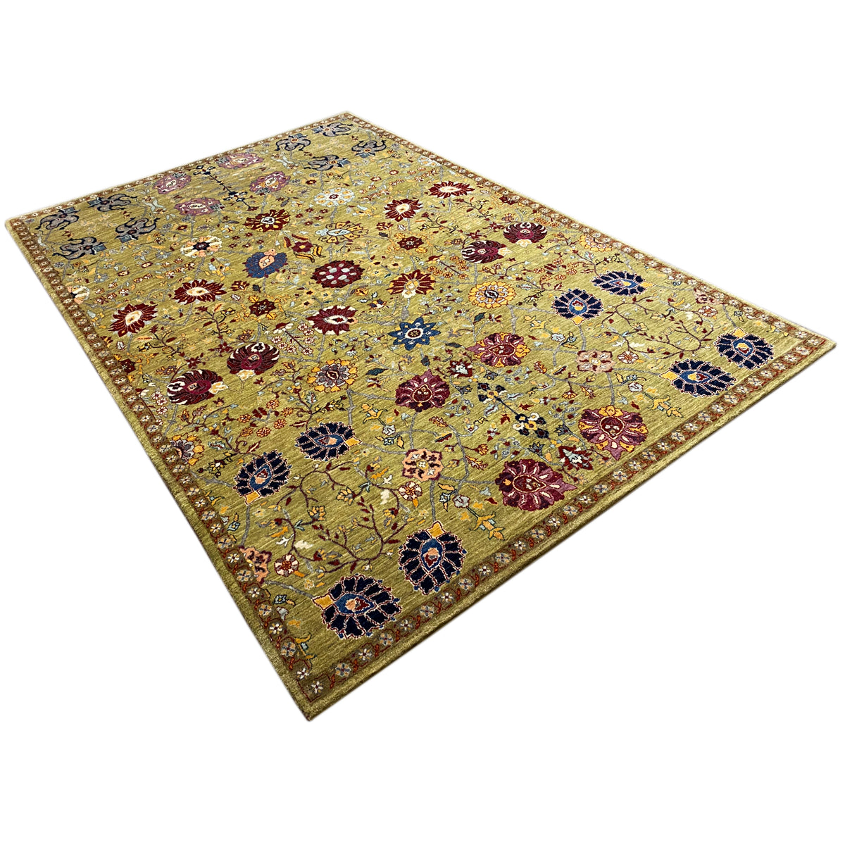 Rectangular oriental rug with an abstract floral pattern in olive, blue, and burgundy