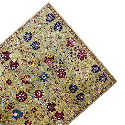 Oriental rug corner with border and abstract ornamental pattern in olive, blue, and red