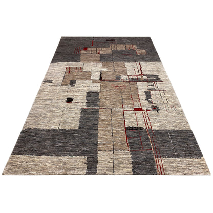 Abstract low-pile rug with patchwork in gray/beige and red accents, viewed from above