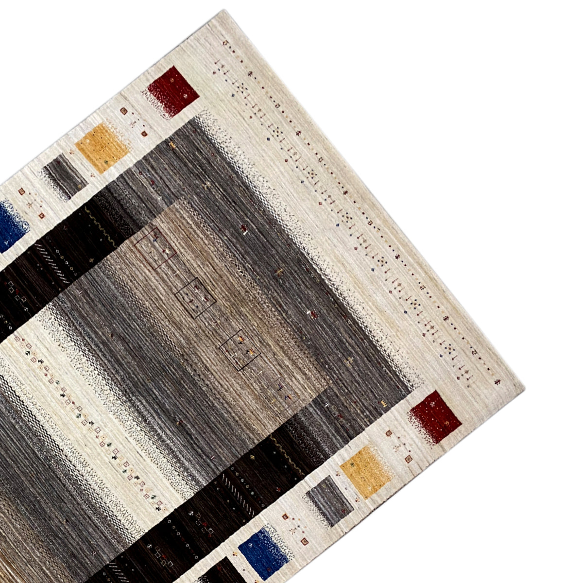 Gabbeh-Luri carpet corner: dark central field, light border, and red/blue-yellow inserts