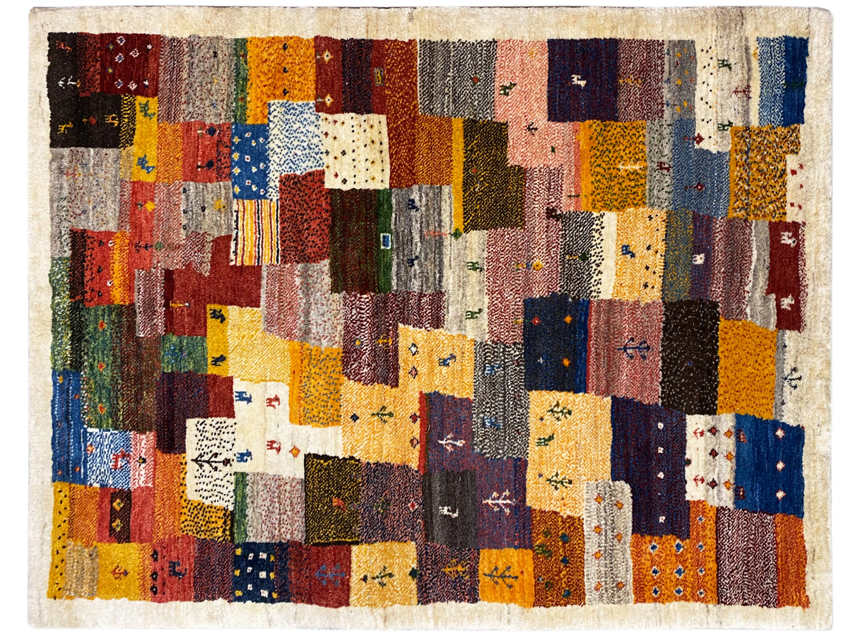 Gabbeh Luri rug 145x105 cm with colorful patchwork and light accents along the edge