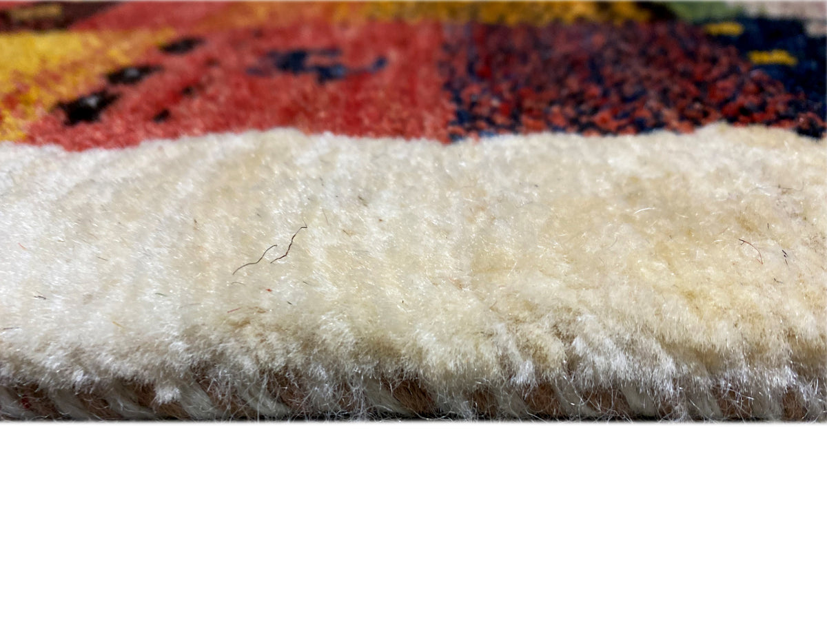 Gabbeh Luri rug 145x105 cm close-up of the light pile edge with fringes