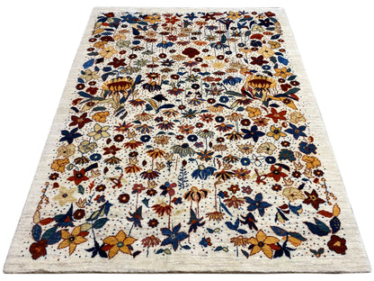 Rectangular rug with a perspective view of the multicolored pile pattern