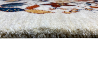 Rug edge with short pile and fringe, light underside visible