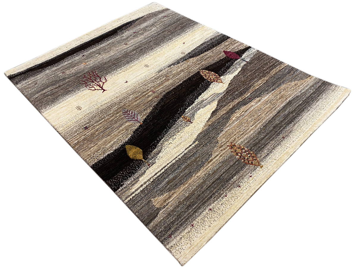 Beige and gray rug with dark arches and small colorful decorative elements