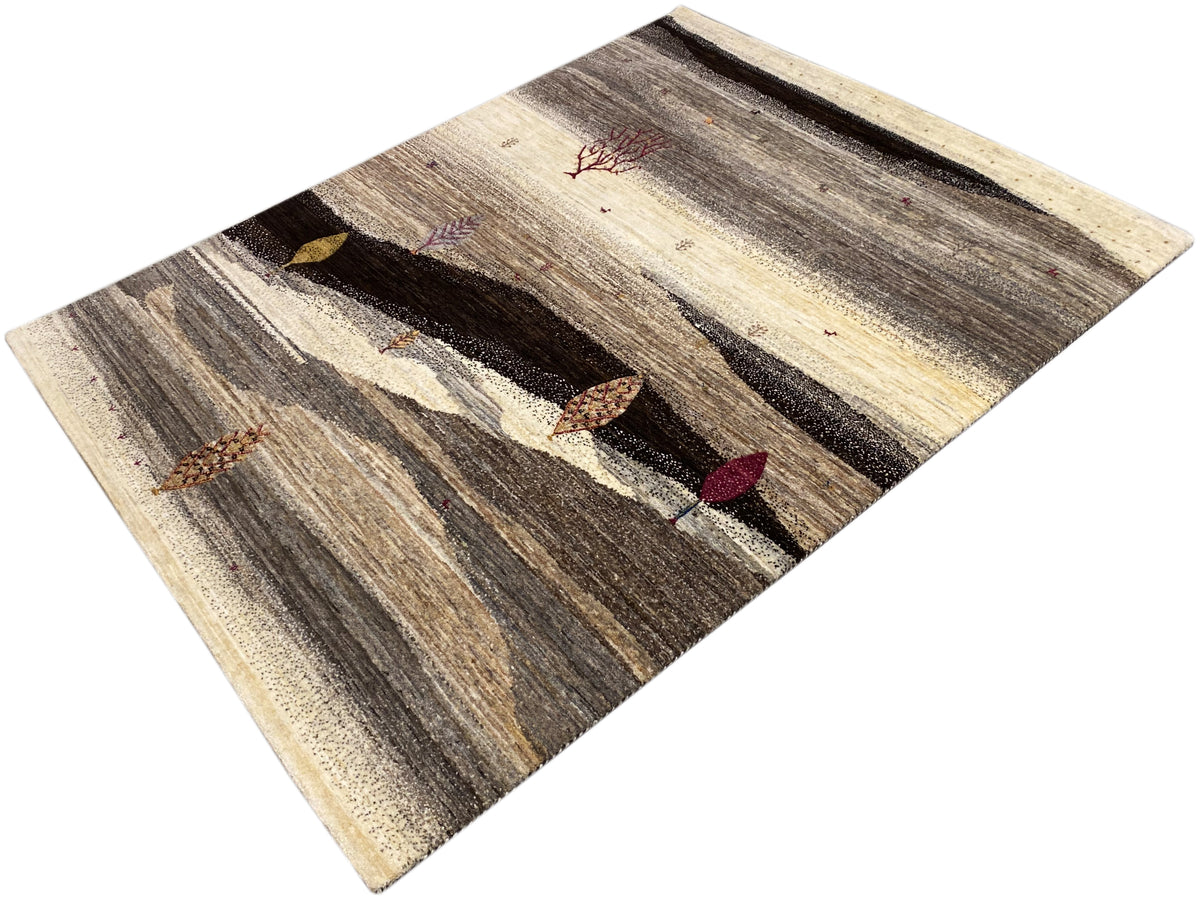 Rug with a diagonal view: dark stripes, light zones, and colorful ornaments