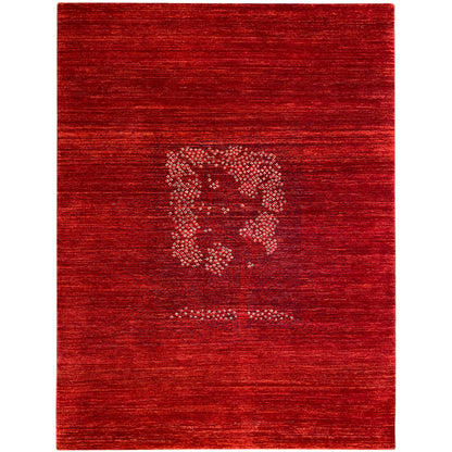 Reddish-brown Gabbeh Luri rug with a woven medallion pattern in the center
