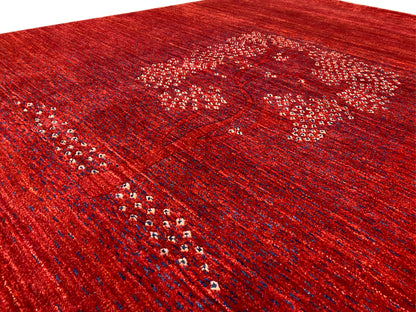 Detailed view of the medallion pattern: reddish-brown texture with glittering dots