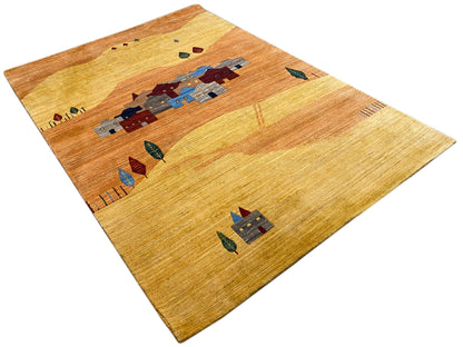 Rug with a light background and a central village motif in blue and red, with a narrow border
