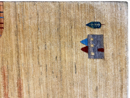 Gabbeh-Luri rug detail: short pile in light brown with a blue element and red accent
