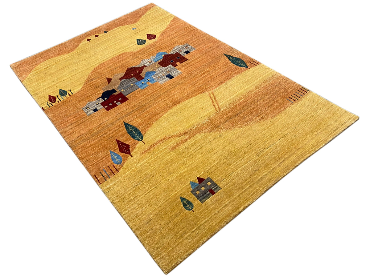 Carpet in detail: row of houses and colorful symbols on a light yellow-brown background