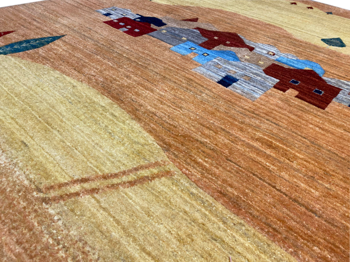 Carpet detail with houses, street patterns, and yellow-brown color fields