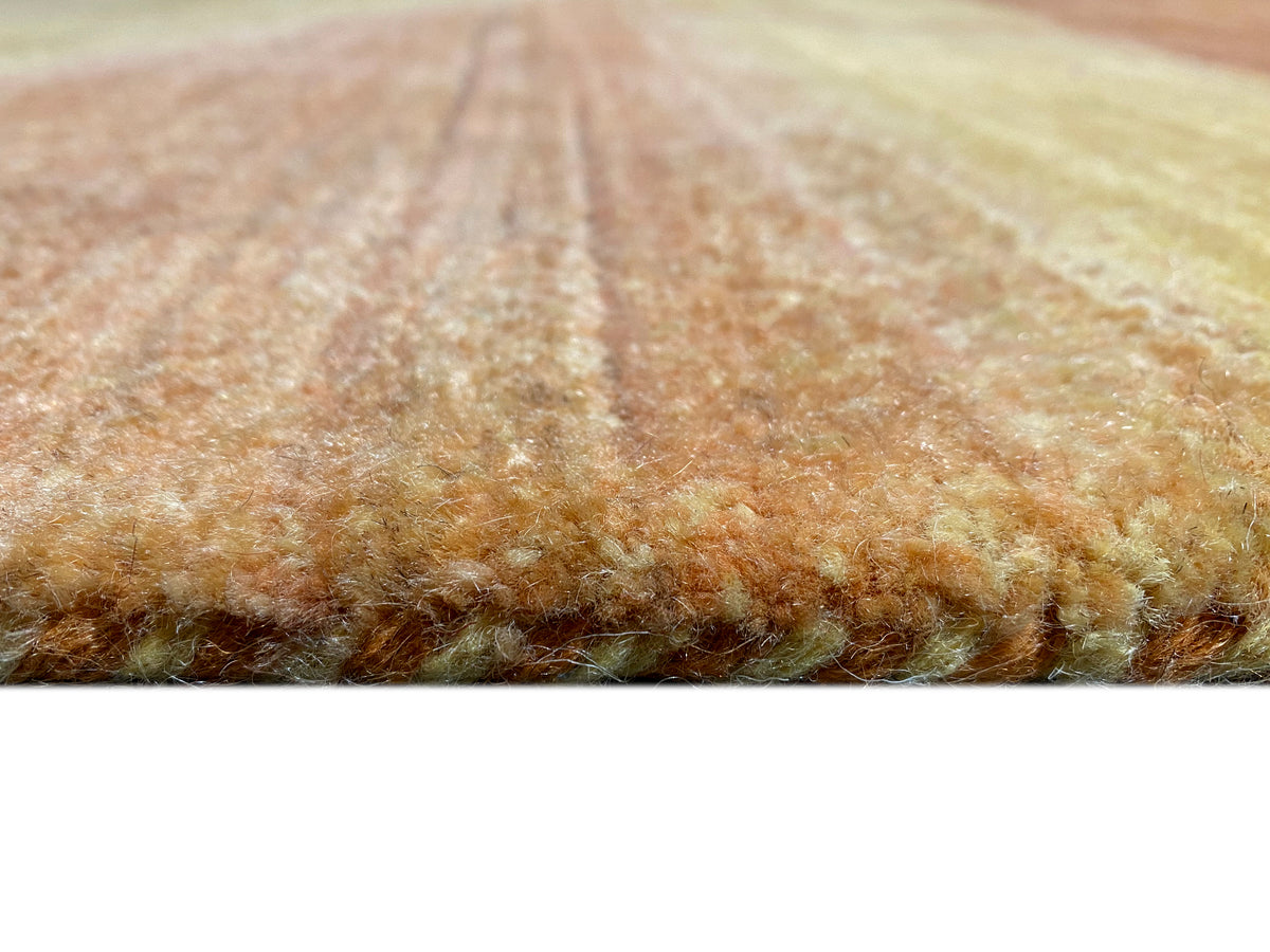 Carpet pile detail: uniform golden-yellow fibers with a subtle texture