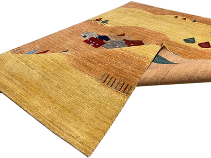 Rug with houses and abstract shapes, yellow-brown with blue and red tones