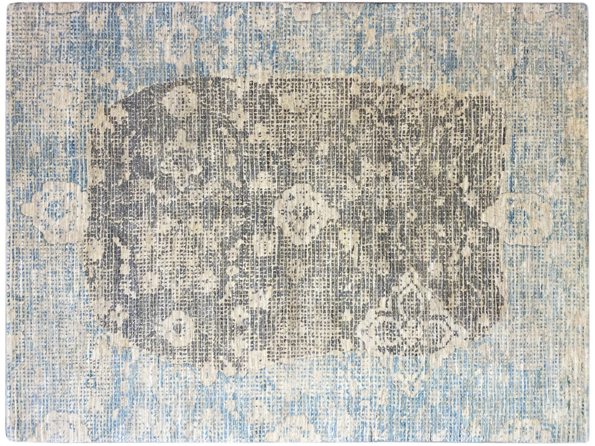 Rug surface with an abstract blue-gray pattern and light accents