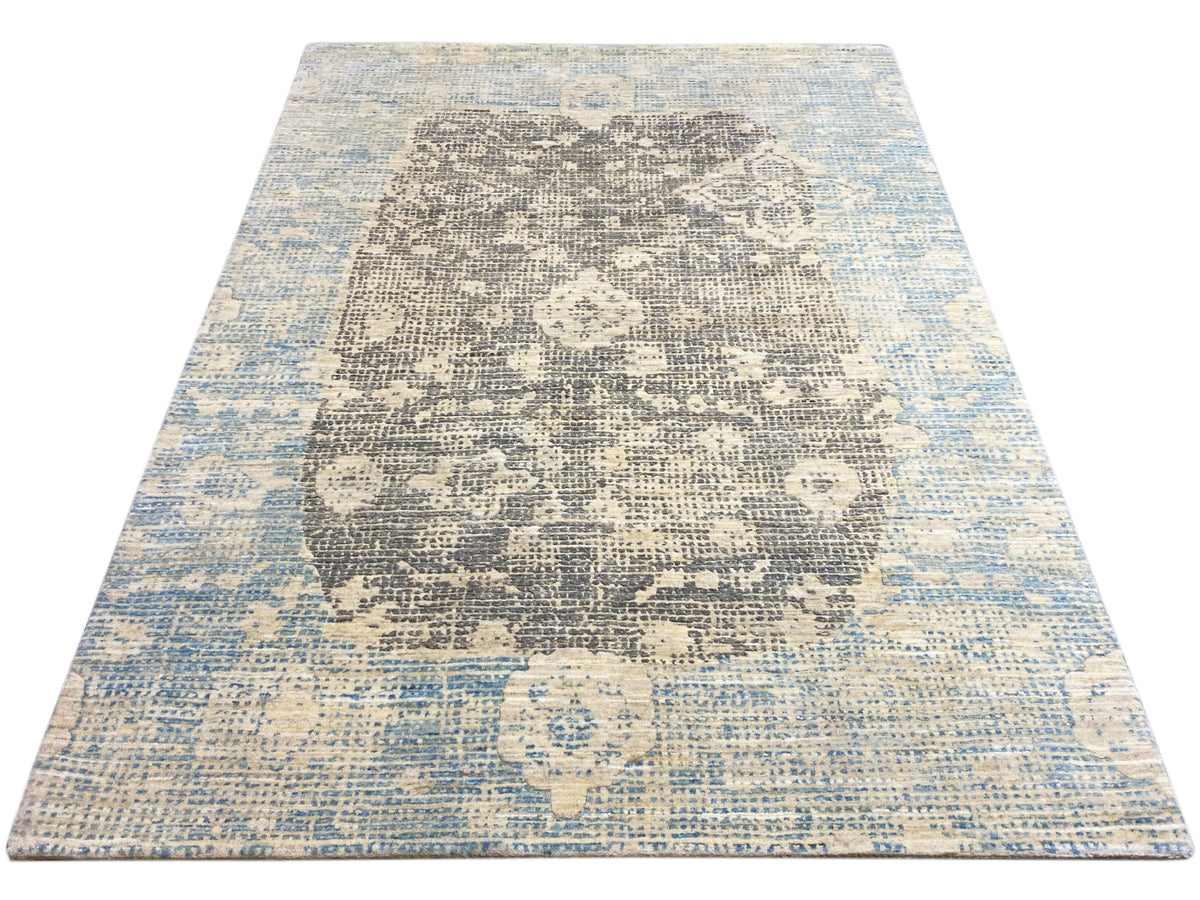 Rug, bleached blue-gray look with a central pattern, rectangular