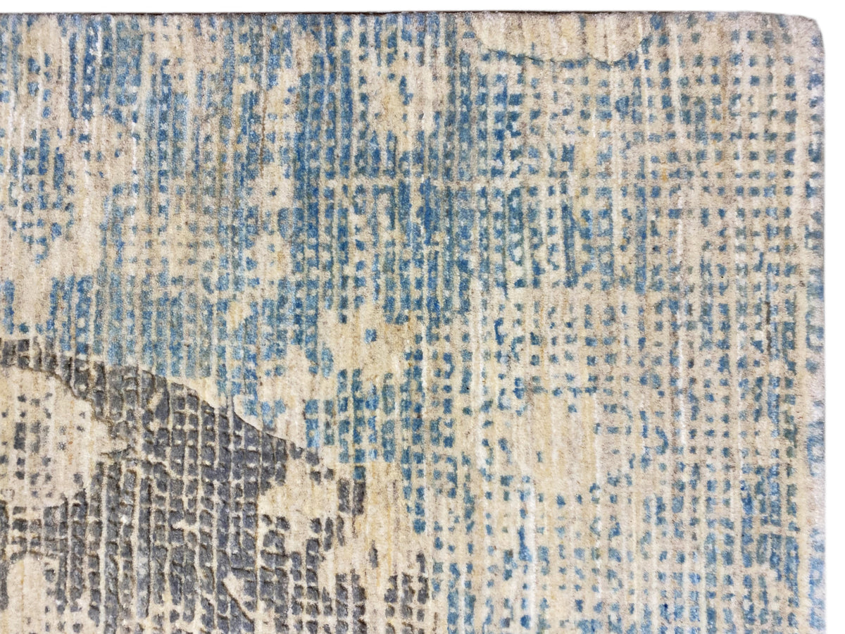 Carpet detail with short-pile textures in blue, light beige, and gray