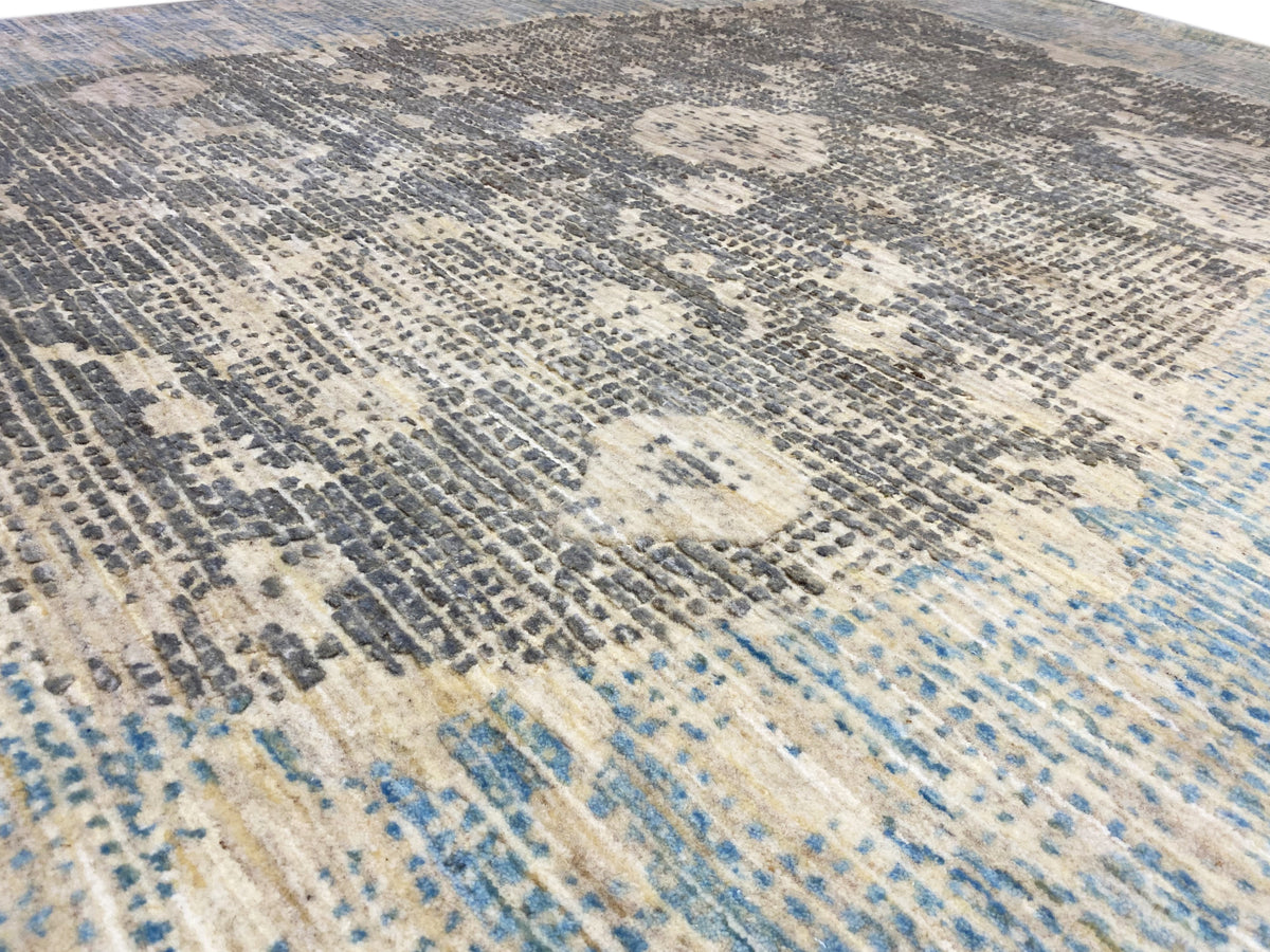 Close-up of the carpet surface with blue-gray lines and spots
