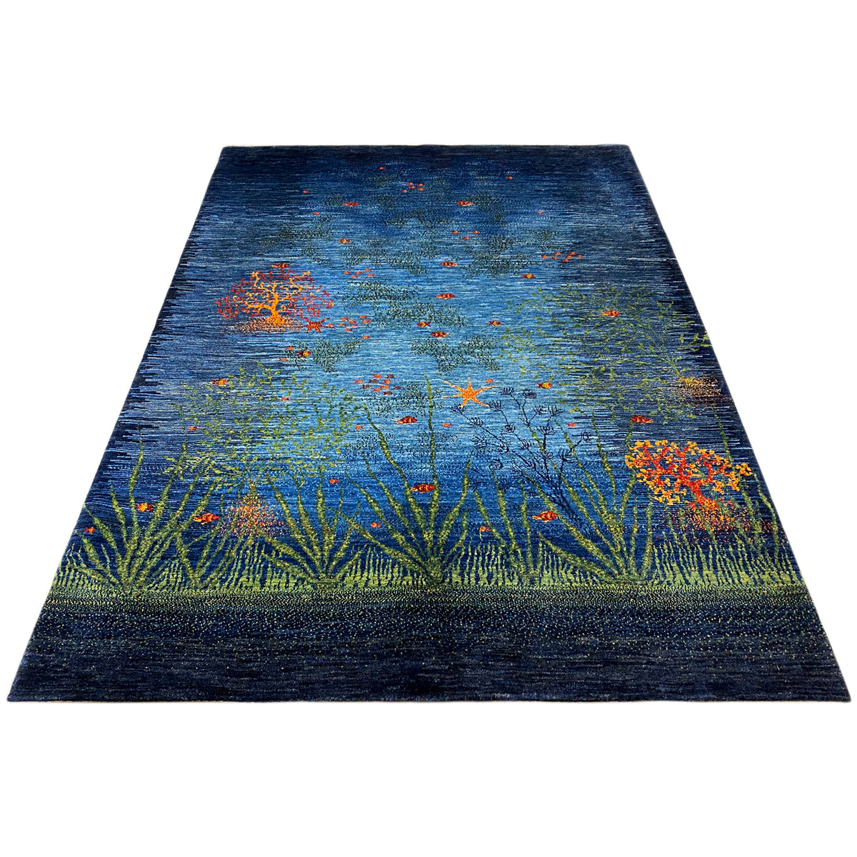 Rug in angled view: blue-green, orange accent motifs, and plant lines
