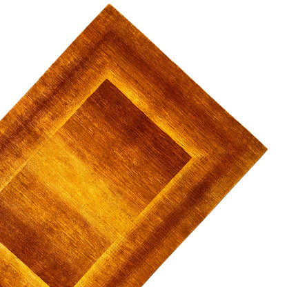 Diamond-pattern rug with border design, amber and brown