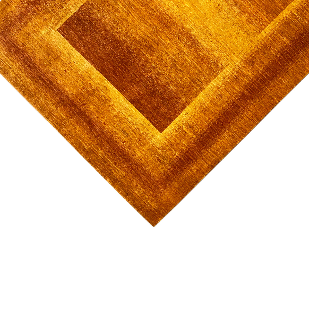 Carpet detail: square motif with a golden-brown border and darker center