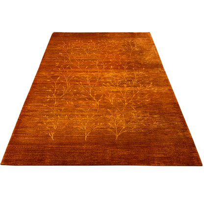 Orange-brown rug with a delicate gold line pattern