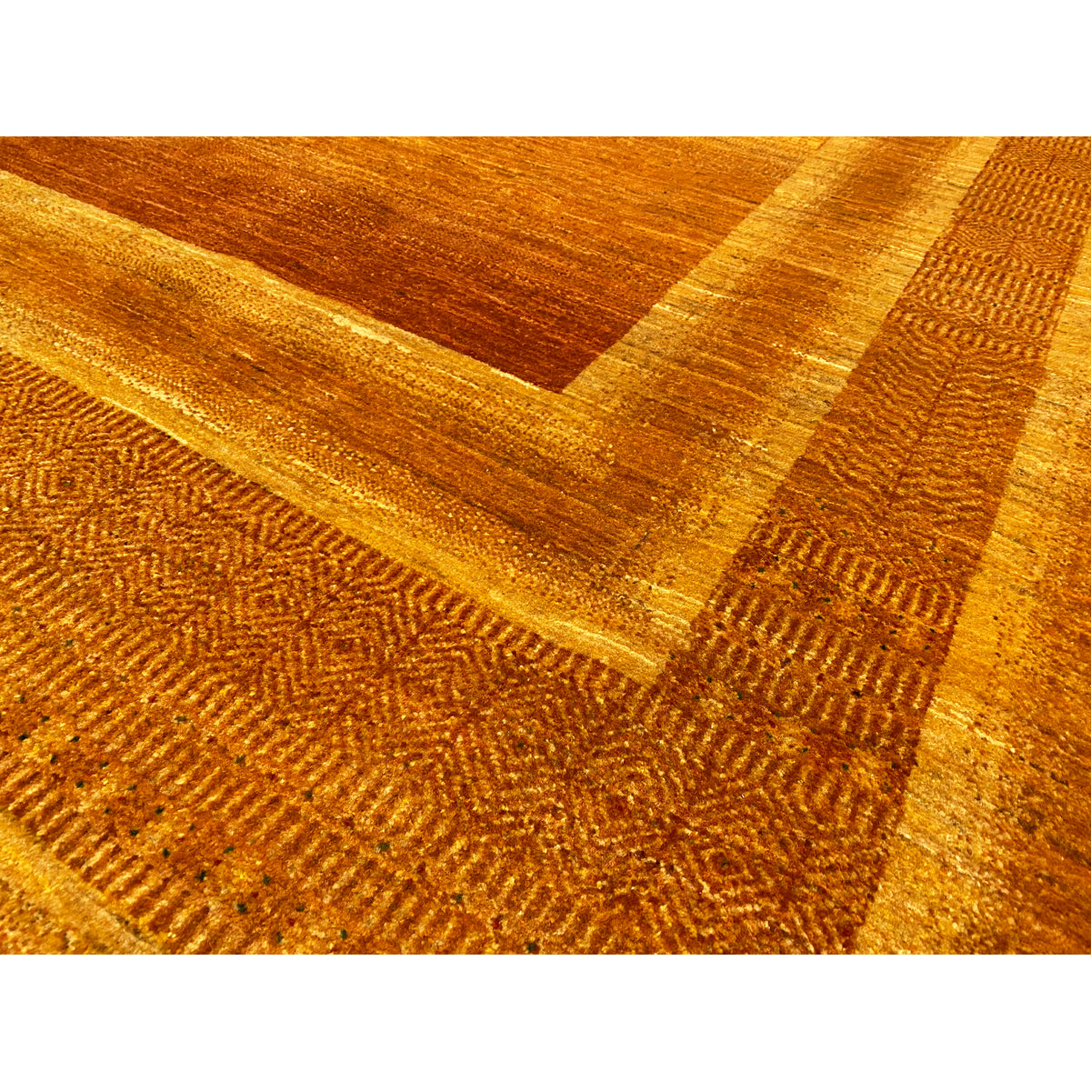 Rug fabric with a fine texture and golden-brown lines in a rectangular pattern