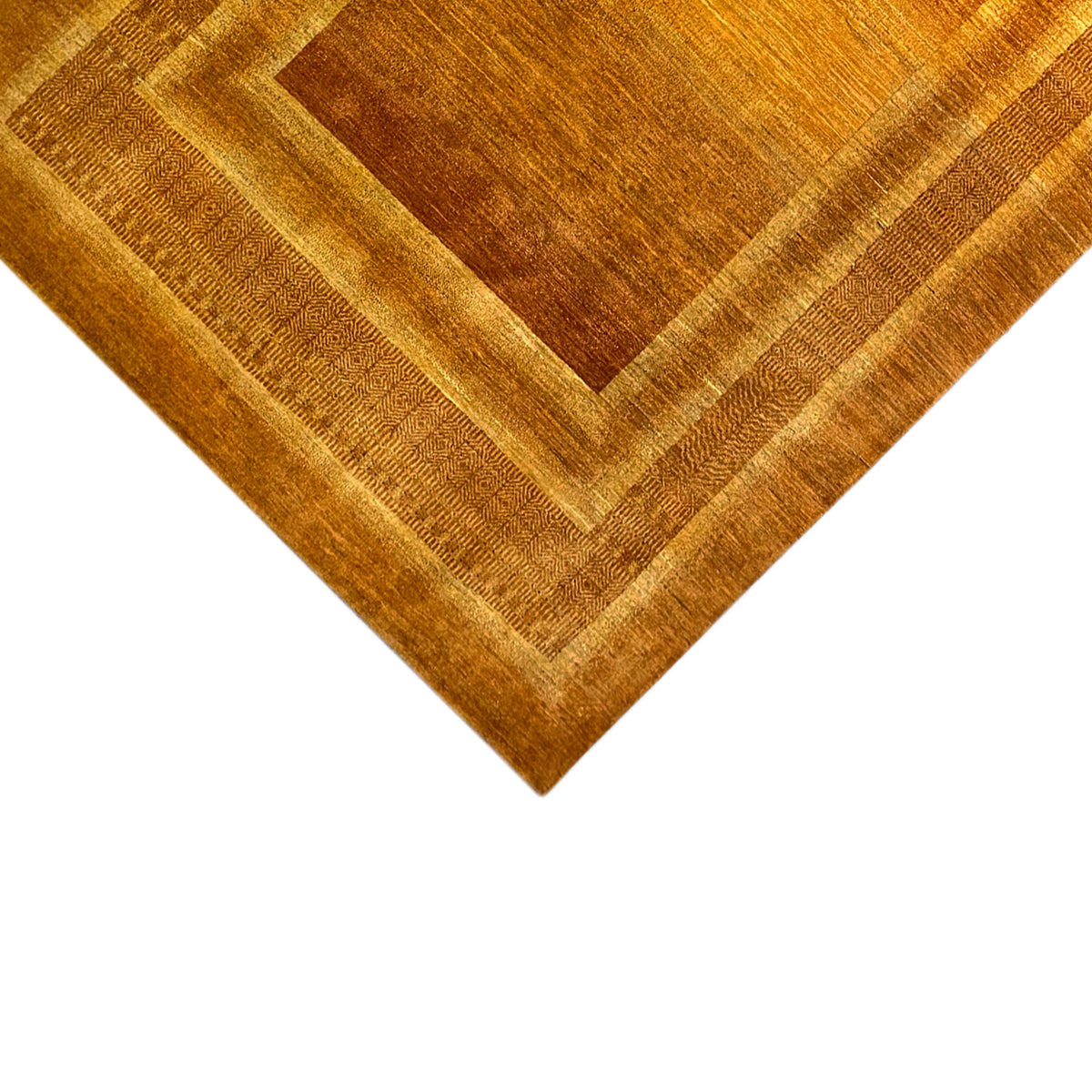 Carpet detail at the edge with integrated lines and a golden-brown patterned border