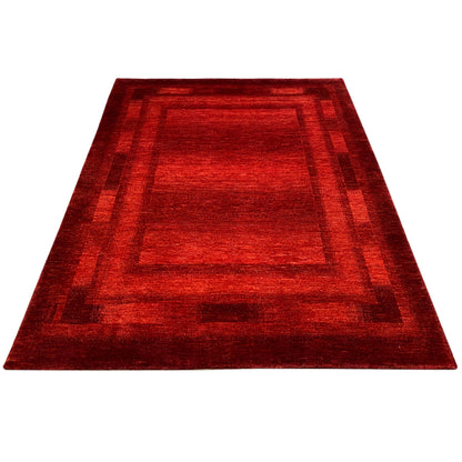 Gabbeh-Luri rug in red with a geometric border and even pile density