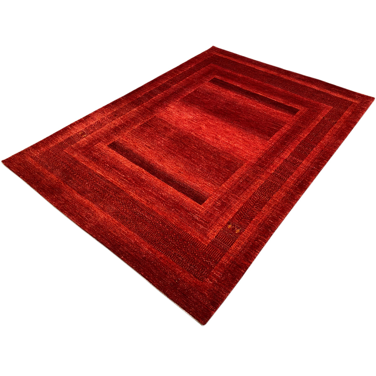 Red Gabbeh Luri rug with geometric lines and a rectangular central motif