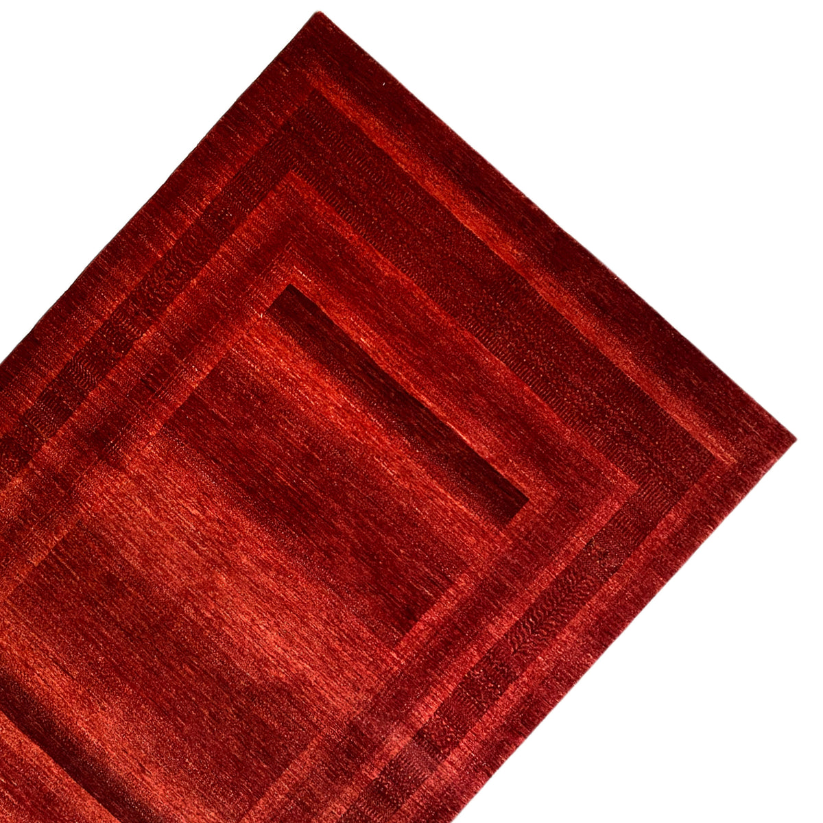 Gabbeh-Luri red rug: close-up of the geometric center and edges