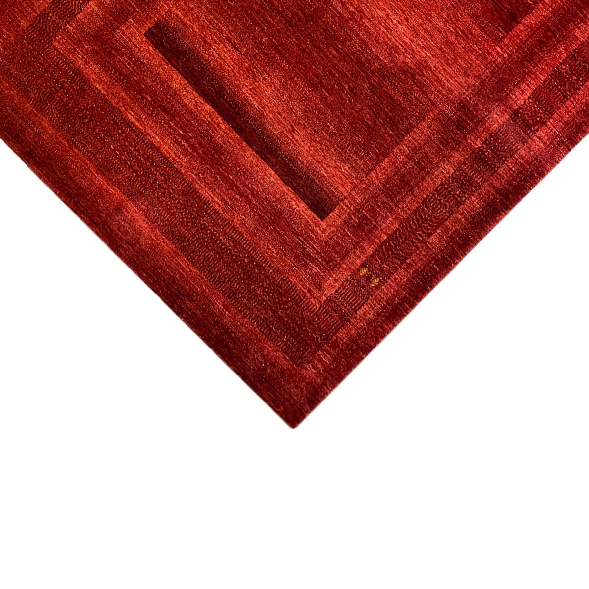 Red Gabbeh-Luri rug, close-up of the diagonal view with pattern and border