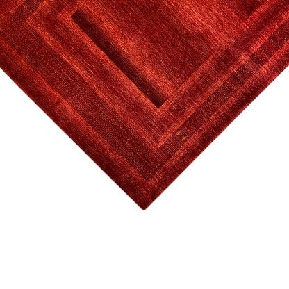 Red Gabbeh-Luri rug, close-up of the diagonal view with pattern and border