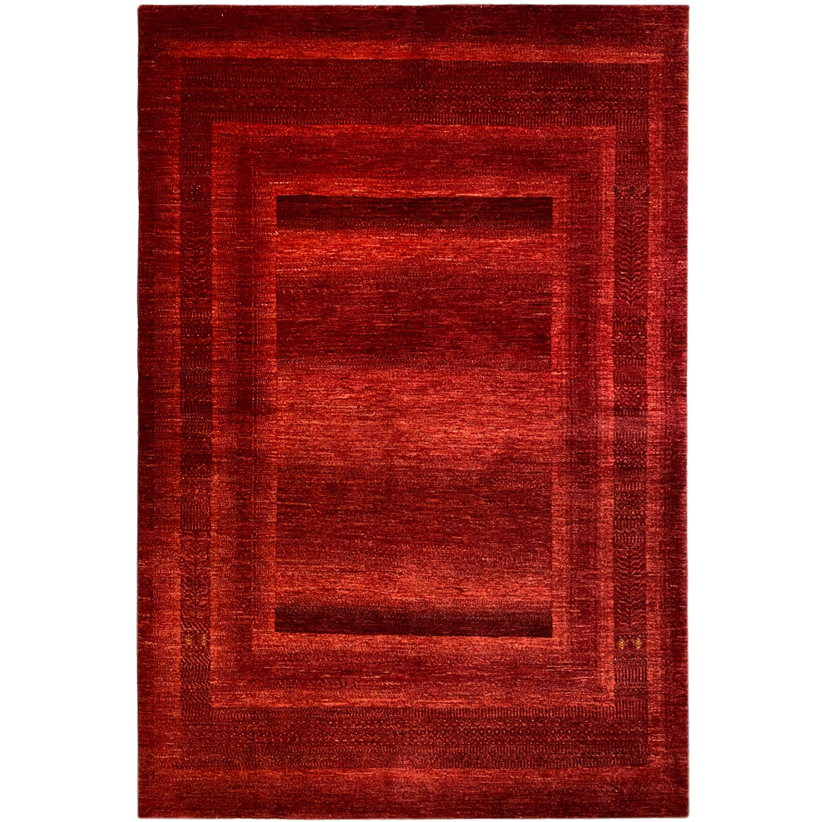 Gabbeh Luri rug with a red geometric pattern and rectangular medallion