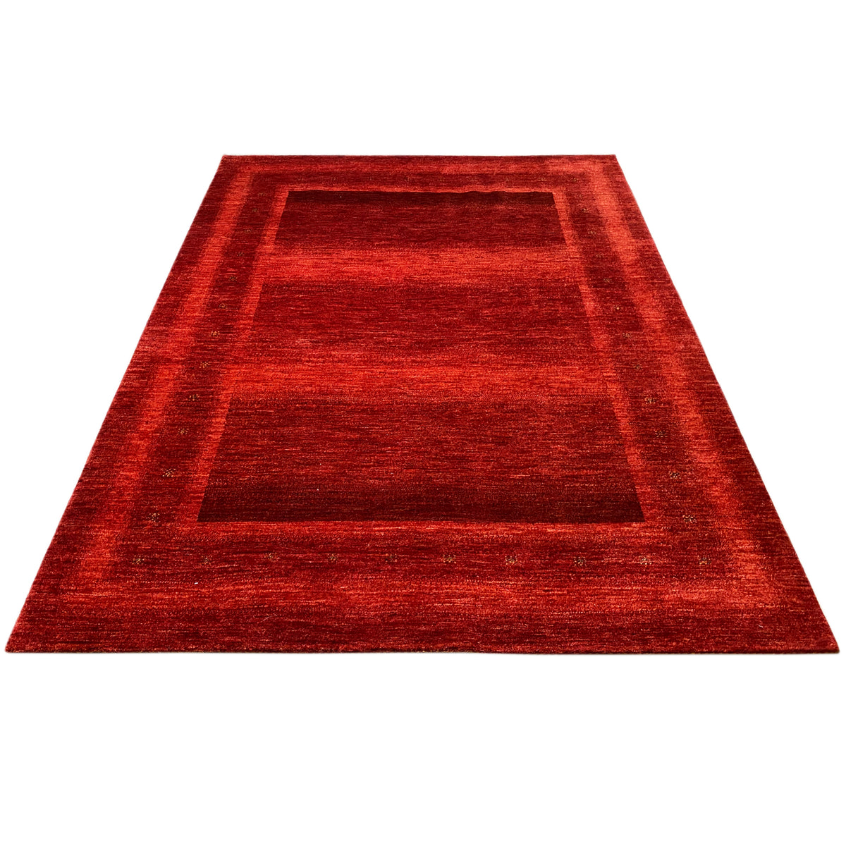 Gabbeh-Luri rug in red, three-quarter view with a distinctive frame