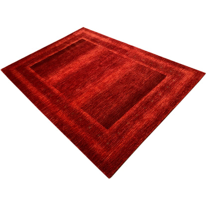 Gabbeh Luri rug in red, diamond pattern with a central border motif