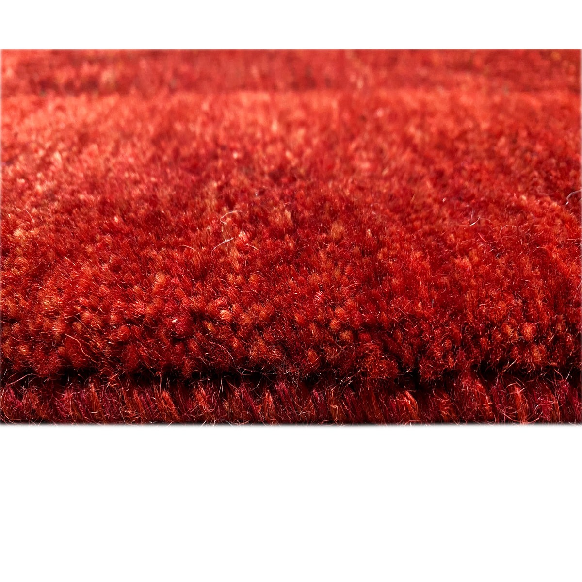Red Gabbeh-Luri rug with dense, short pile and even texture