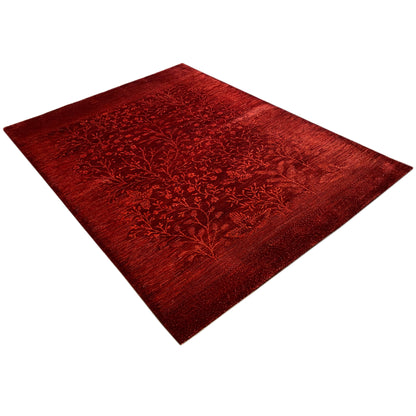 Red carpet in a diamond pattern with dense floral branch motifs