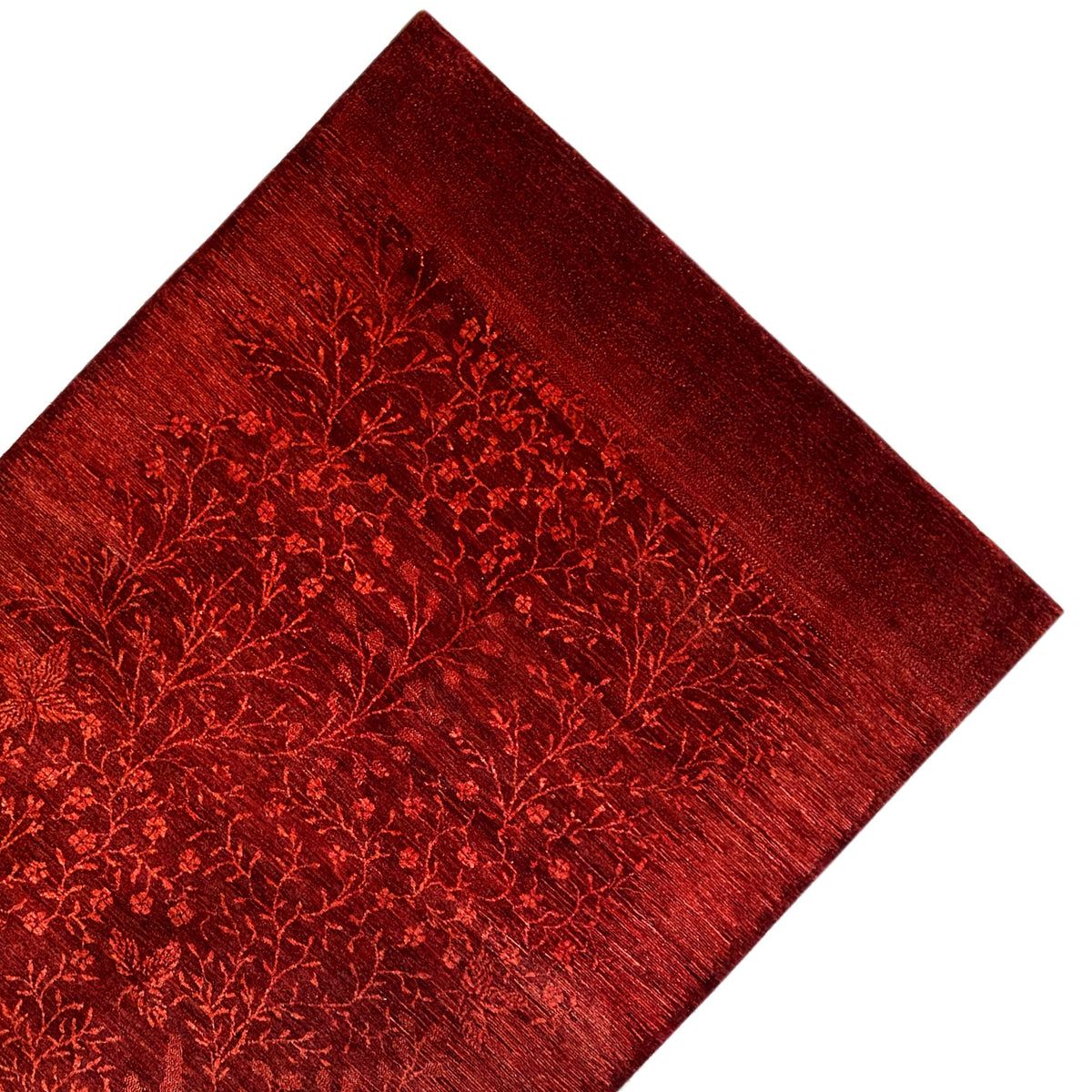 Red carpet diagonally patterned with floral branch ornaments of uniform density