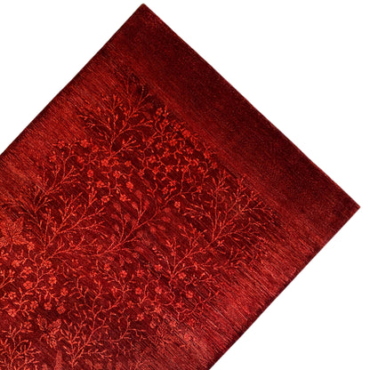 Red carpet diagonally patterned with floral branch ornaments of uniform density