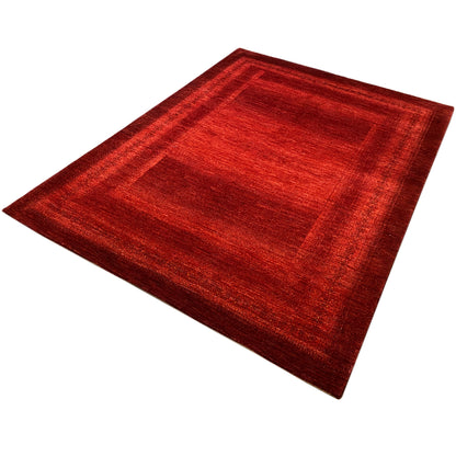 Red carpet with a geometric pattern, spread out diagonally
