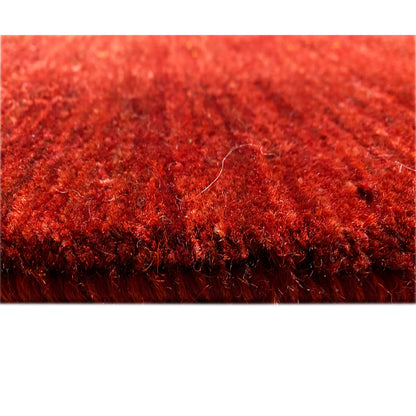 Red carpet: pile and texture in close-up with visible edge