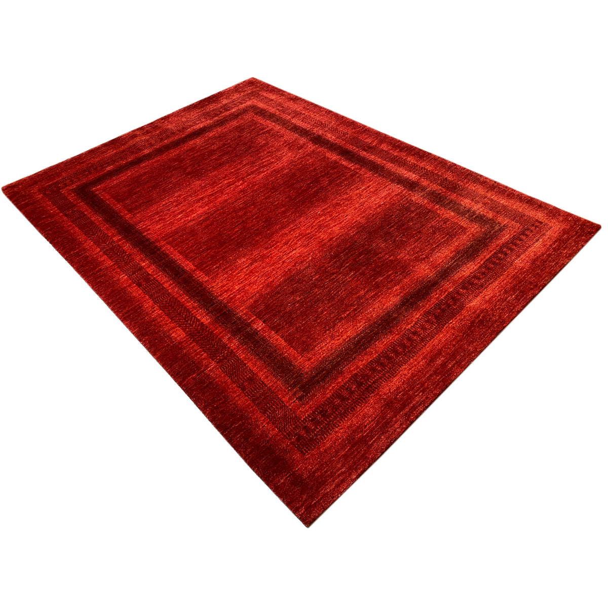 Red carpet with a square center and multi-row border