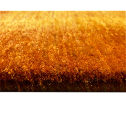 Rug edge with fringe in brown and orange-brown, dense pile