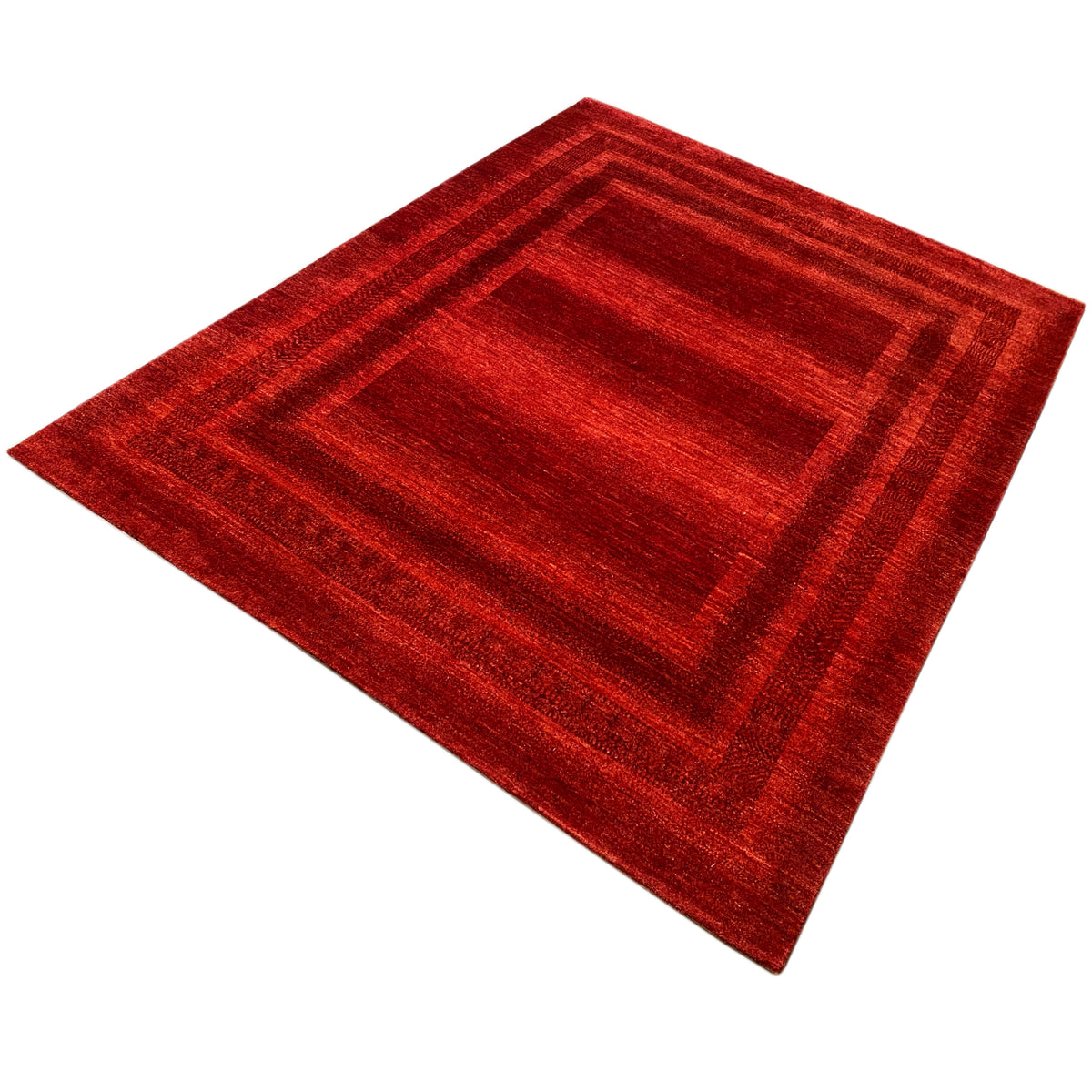 Red carpet, diagonal view, centered frame pattern with borders