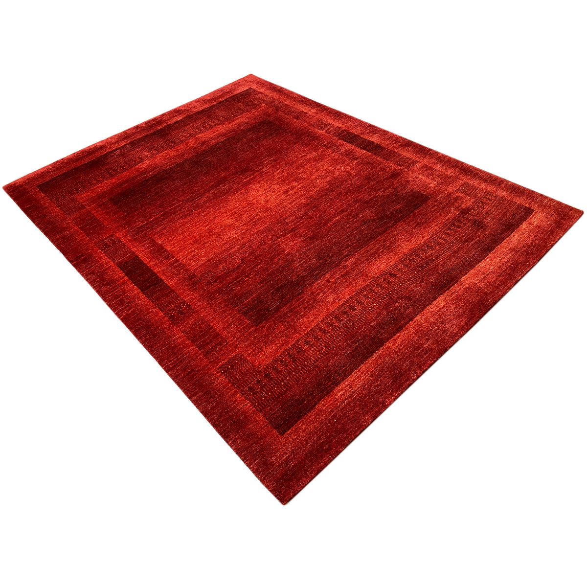 Gabbeh Luri rug at a diamond angle, reddish-brown pattern with a border frame