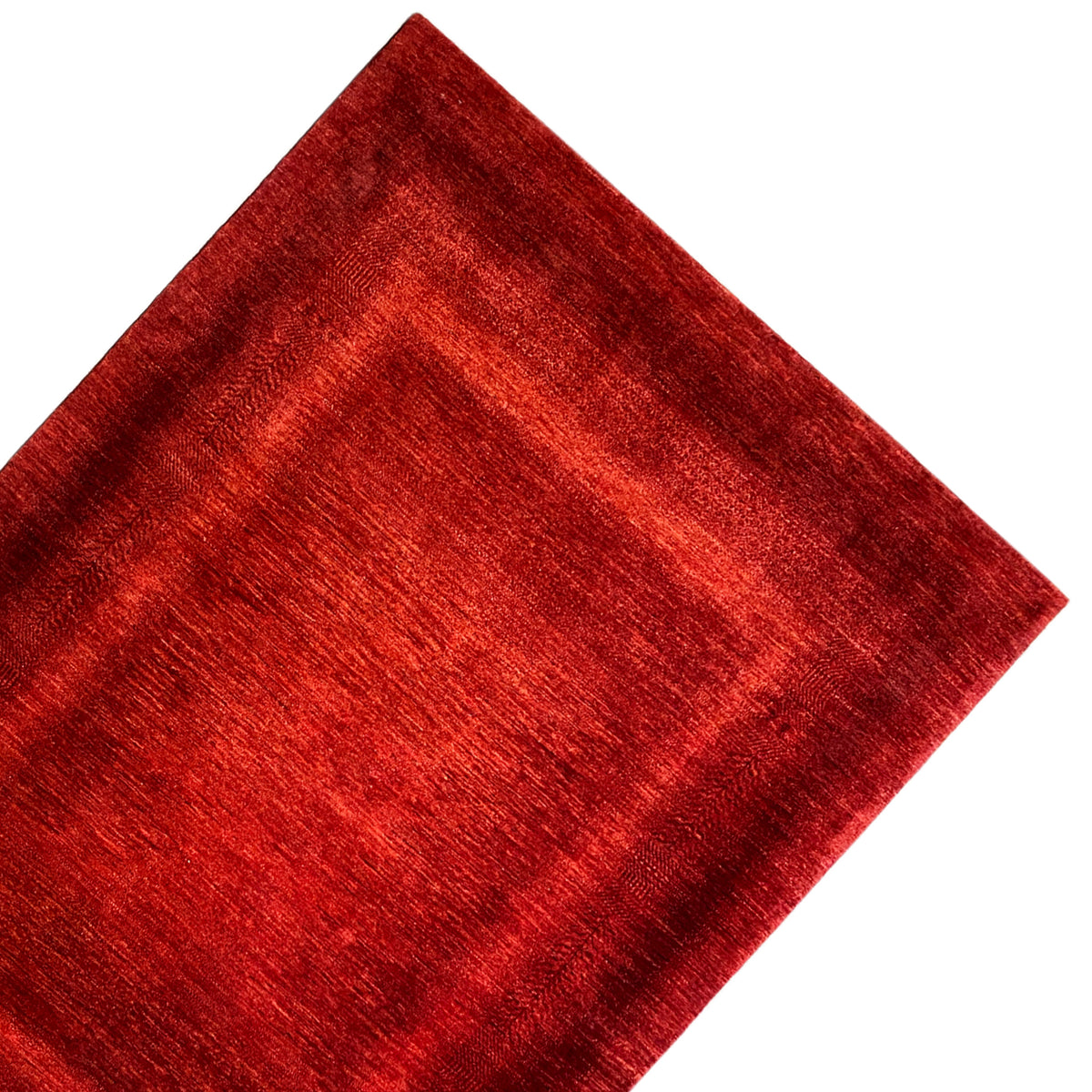 Red carpet viewed from the front, rounded pattern area, and bold colors
