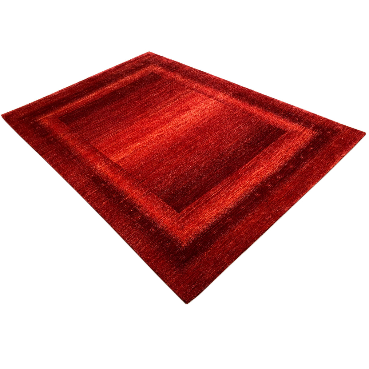 Gabbeh-Luri rug in red, diagonal view with rectangular pattern